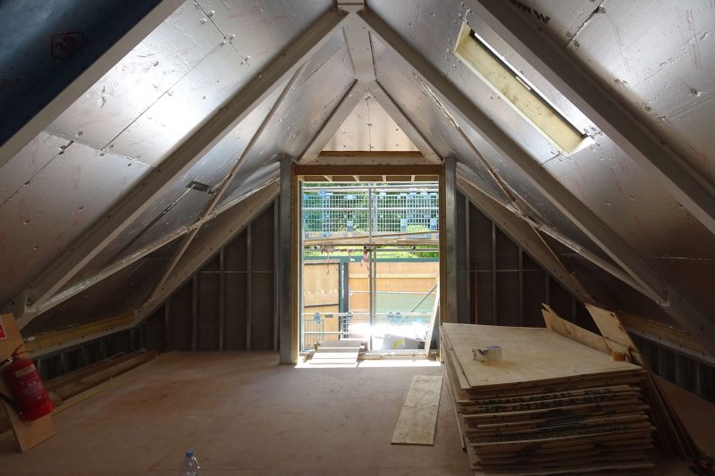 View of the hay loft above the stables under construction